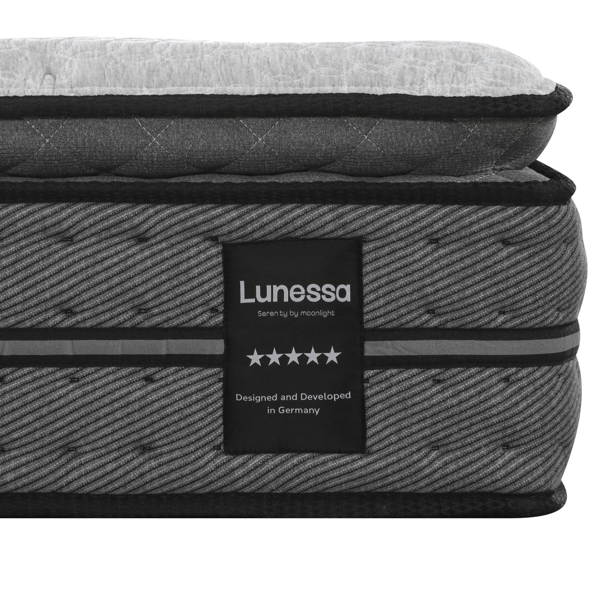 Seitenfläche der Lunessa Zenith mit Lunessa-Etikett, zwei hellen Zierbändern und Pillow-Top-Kante